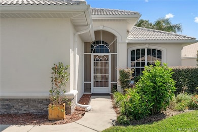 Nice, shaded and screened front entry.