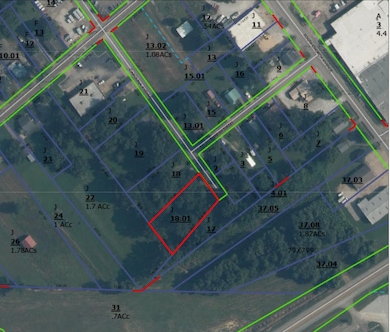 Aerial map of property and surrounding area with property parcel outlined