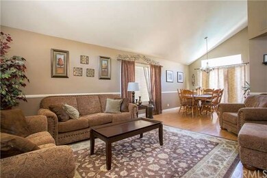 Formal living room and dining room. Lot's of natur