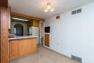 Dining Area to Kitchen