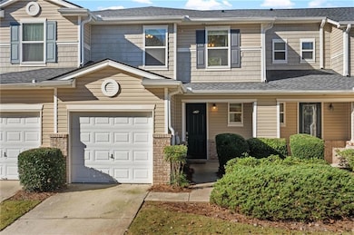 View of front facade featuring covered porch, driveway, brand new roof with shingles, and vinyl siding