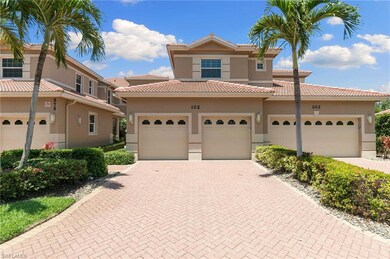 View of front of home featuring stucco siding, a t
