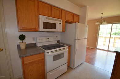 Kitchen has corian countertops