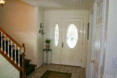 Custom Door with cut glass features in entryway, t