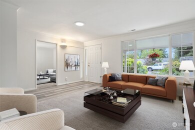 Living area off the entry hall - Virtually staged to provide a sense of size and uses