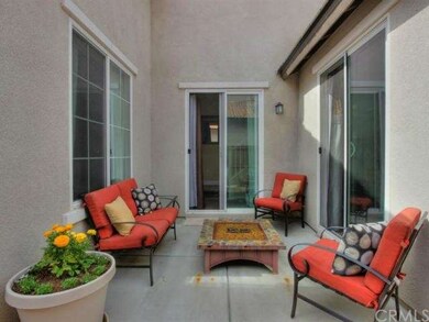 Entry to the Courtyard from Hallway and Formal Din