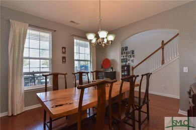 Separate dining room with beautiful wood floors!