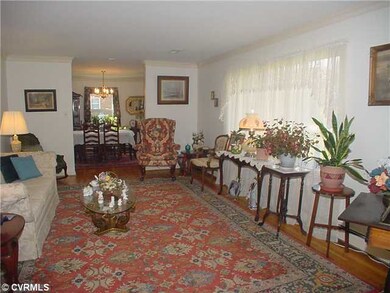 Other - Living room with refinished oak floor.