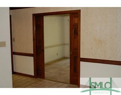 Dining Room. Pocket doors lead to the dining room