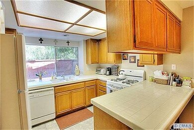 Bright kitchen offers plenty of cabinet and counte