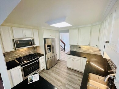 Quartz Counter Tops, Ceramic Backsplash, Under Cab