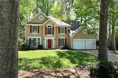 Colonial house with an attached garage, concrete d