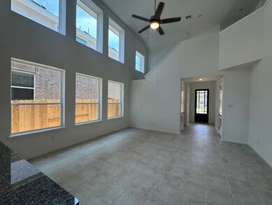 Unfurnished living room featuring plenty of natur