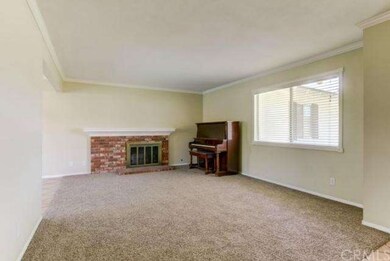 Classy Fireplace and Molding in Living Room. 