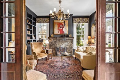 Den-Gas Fireplace with Marble Surround
