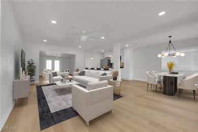Living area featuring light wood-style flooring, a