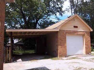 Small detached garage with carport.  Along with wo