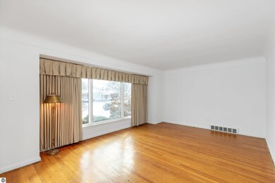 Nice large windows overlooking the landscaped fron