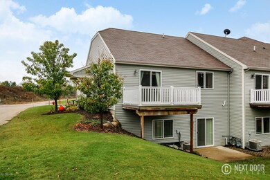 1207 Coopers Pass SW unit 37, Byron Center, MI 49315 - photo 2