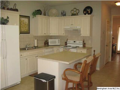 HUGE KITCHEN WITH ISLAND, BREAKFAST BAR AND EATING