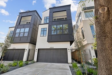 Welcome to this modern patio home with sleek curb