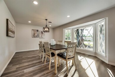 Dining space featuring dark hardwood / wood-style 