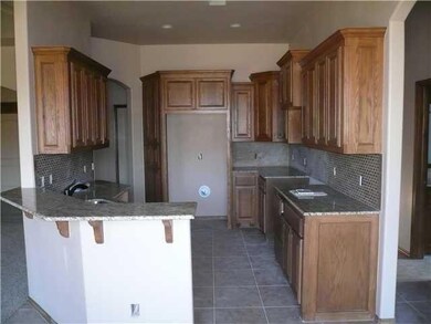 Kitchen. Granite Counters, Tiled Back Splash, Oil 
