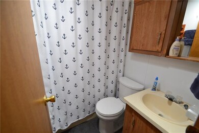 Bathroom with tub and shower.