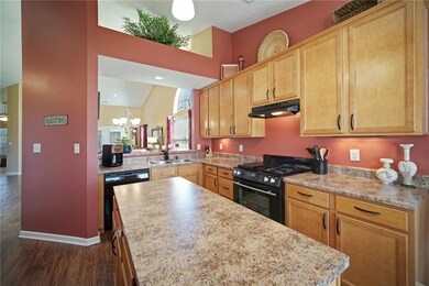 Large kitchen island, pantry to the left.