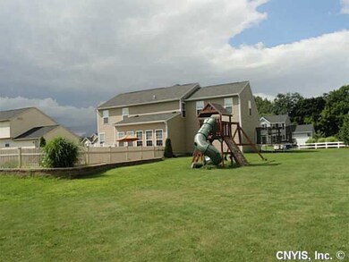 Yard. This home is situated on over half an acre. 