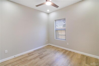 Unfurnished room featuring light wood-style flooring and recessed lighting