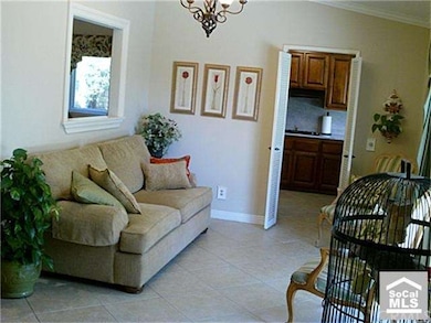 Another sitting room near the kitchen and dining a