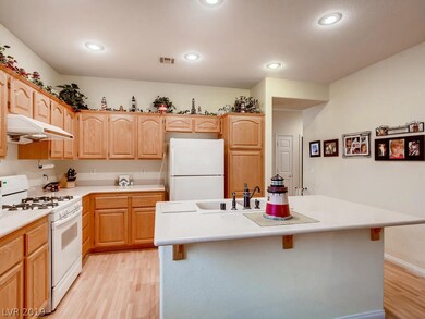 View from family room into kitchen. Hallway on rig