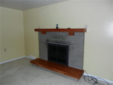 Add warmth to the room by lighting the natural sto