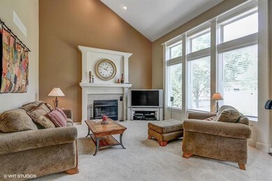 Soaring ceiling, wall of tall windows in the great