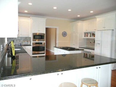 Kitchen - Kitchen with Granite, Travertine Backspl