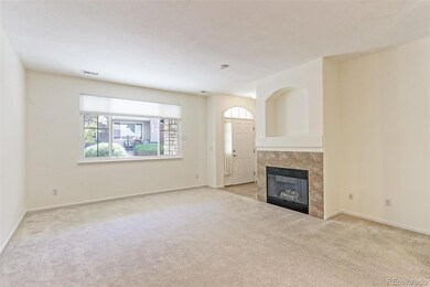 Living room w/ fireplace and nook-great sunlight!