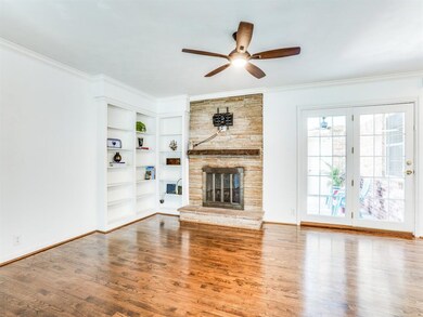 Family room has built in bookshelves, gas fireplac