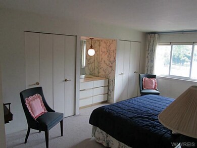 Master Bedroom Walk in closet and 2 additional clo