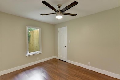 Unfurnished room featuring baseboards, a ceiling 