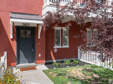 Entrance to property featuring a standing seam roof and a metal roof