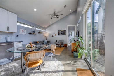 Dining room featuring finished concrete flooring,