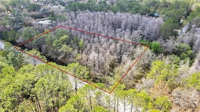 West view of corner lot on West Dr.