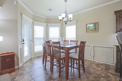 Breakfast nook with tons of sunshine, crown moldin