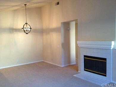 High ceilings and fireplace!