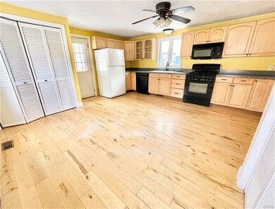 There is a second large coat or pantry closet in t