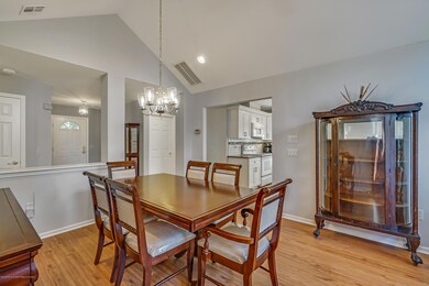 View toward front door and kitchen