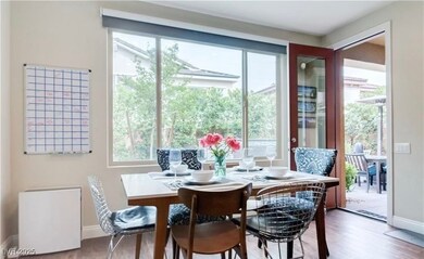 Dining room featuring baseboards and wood finished