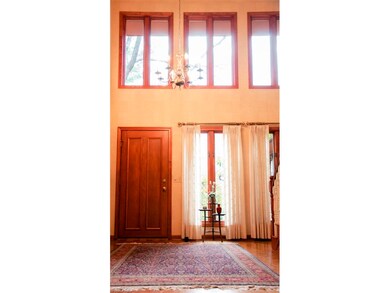 Two story foyer with hard wood