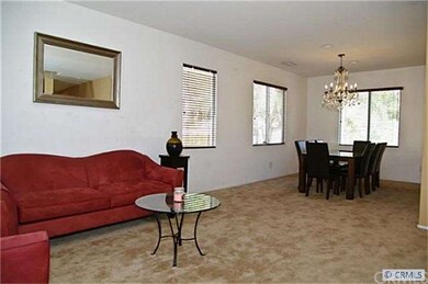 Living room looking into formal dining room